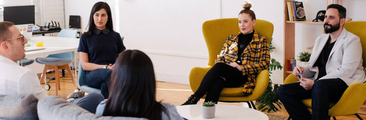 Maise Technology team members meeting in a modern office lounge